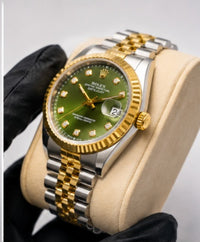 Rolex Oyster Perpetual Datejust 36 – Green Sunburst Dial | Diamond Hour Markers | Yellow Rolesor Jubilee Bracelet